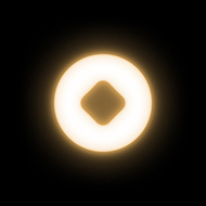 Glowing white circular shape with a diamond-shaped hollow center on a black background.