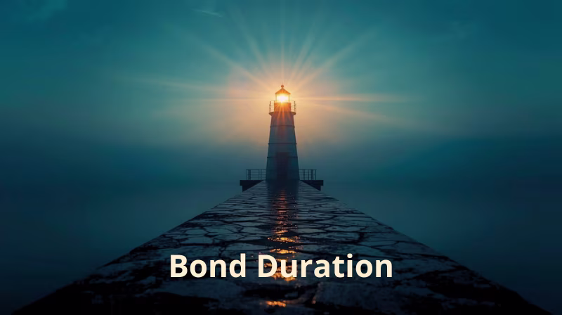 Lighthouse shining light at night symbolizing bond duration as a guide to managing interest rate risk in investing